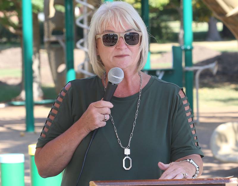 Tammy Lange executive director at the Princeton Park District  speaks during a new playground dedication on Monday, Sept. 15, 2025 at Zearing Park in Princeton. "We are so humbled and blessed," said Lange. The 7,000 square-foot playground features sensory panels, in-ground merry-go-round with back support, slides, swings, health development and creative play. Half of the project was paid for by a OSLAD grant and the other half was purchased by the Princeton Park District. No tax dollars were used for the project.