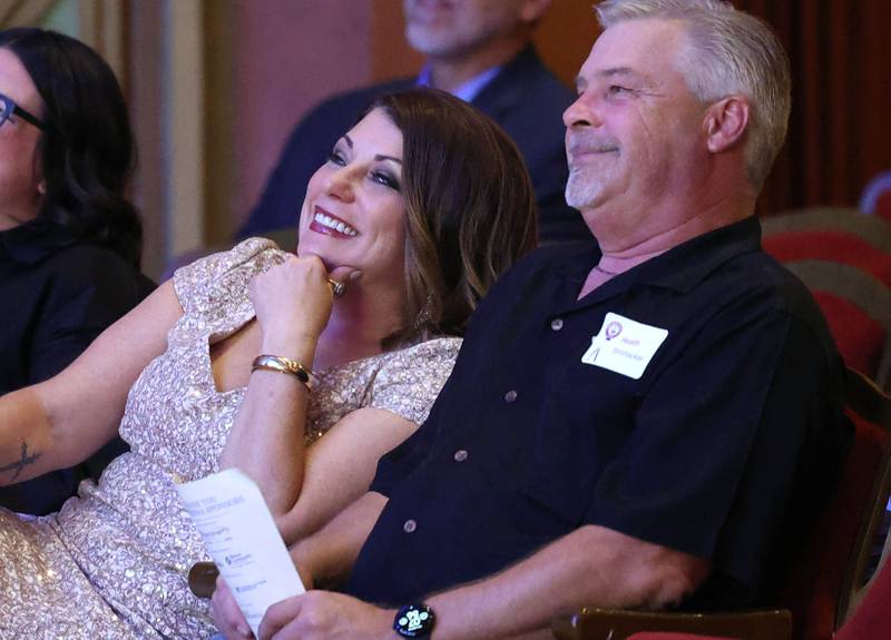 Cortney Strohacker smiles as she is introduced as an Athena Award finalist Thursday, Oct. 10, 2024, during the Athena and Women of Accomplishment Awards reception hosted by the DeKalb Chamber of Commerce at the Egyptian Theatre.