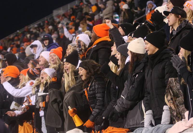 Byron super fans cheer on the Tigers as they play Mt. Carmel during the Class 3A State football championship on Friday, Nov, 24, 2023 at Hancock Stadium in Normal.