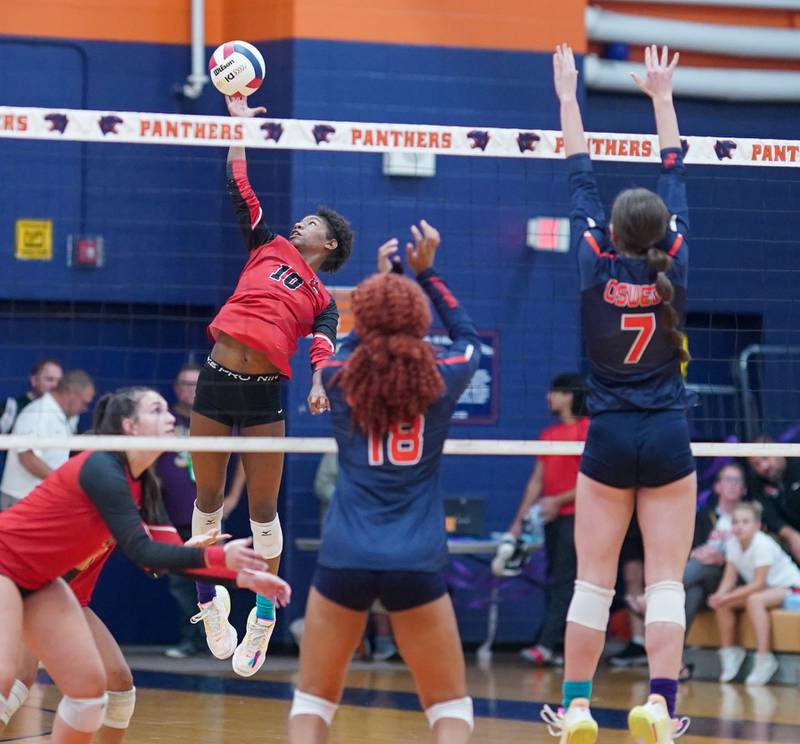 Yorkville's Joelle Pye-Blacknard (10) goes up for a kill against Oswego during a volleyball match at Oswego High School on Thursday, Sept. 14, 2023.