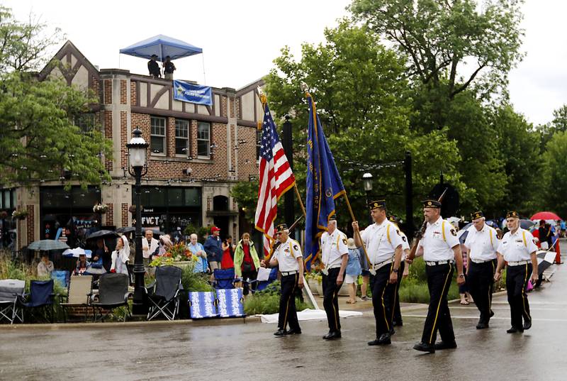 The America Legion Honor Guard carries the American Flag at the start of the Lake Bluff Fourth of July parade on Friday, July 4, 2025, in Lake Bluff.