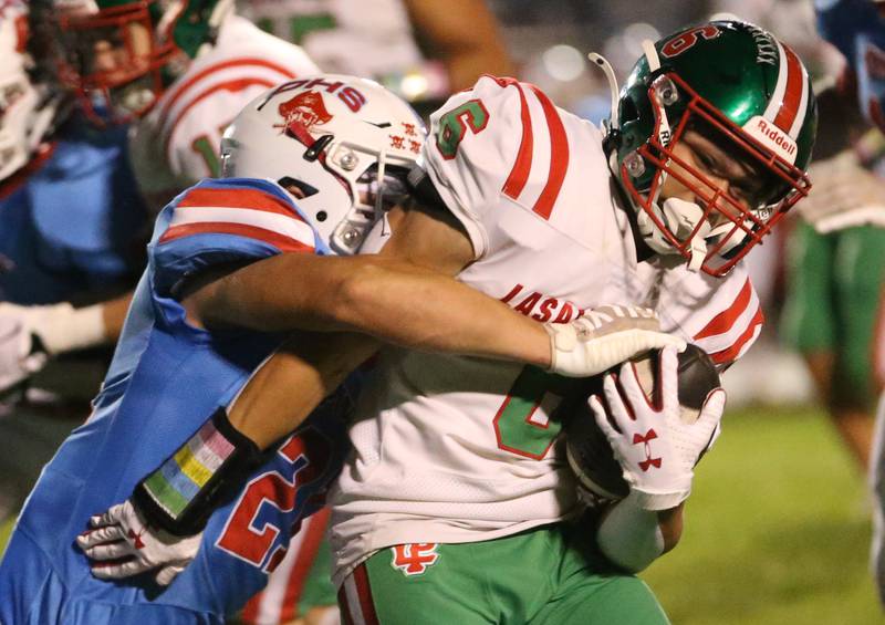 Ottawa's Jace Vieth makes a tackle on L-P's Adrian Arzola on Friday, Oct. 4, 2024 at King Field.
