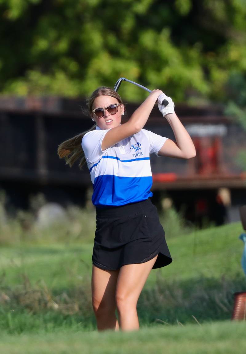 Princeton's Hailee Pemberton watches her iron shot Thursday a Wyaton Hills.