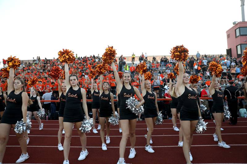 St. Charles East dance team members perform during the season opener against Lincoln-Way Central in St. Charles on Friday, Aug. 26, 2022.