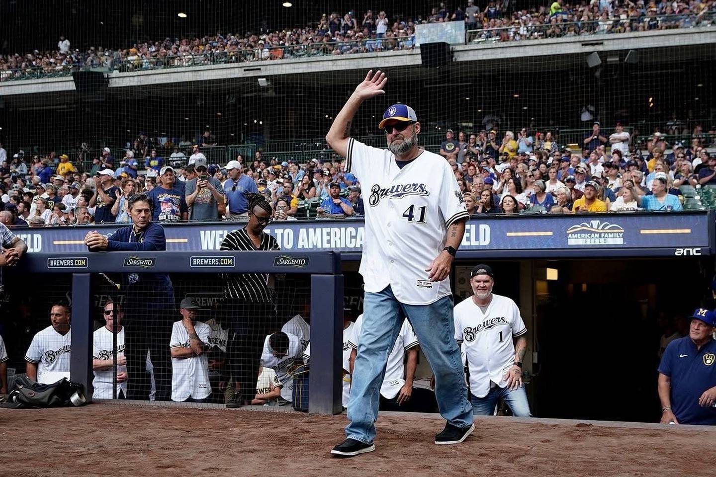 Danny Kolb waves to the crowd during introductions during the 25th anniversary of the Milwaukee Brewers stadium now called American Family Field.