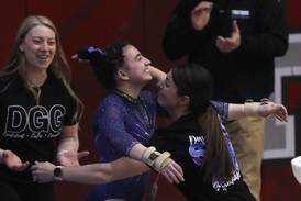 Downers Grove co-op sets another record in dominating performance at state gymnastics meet