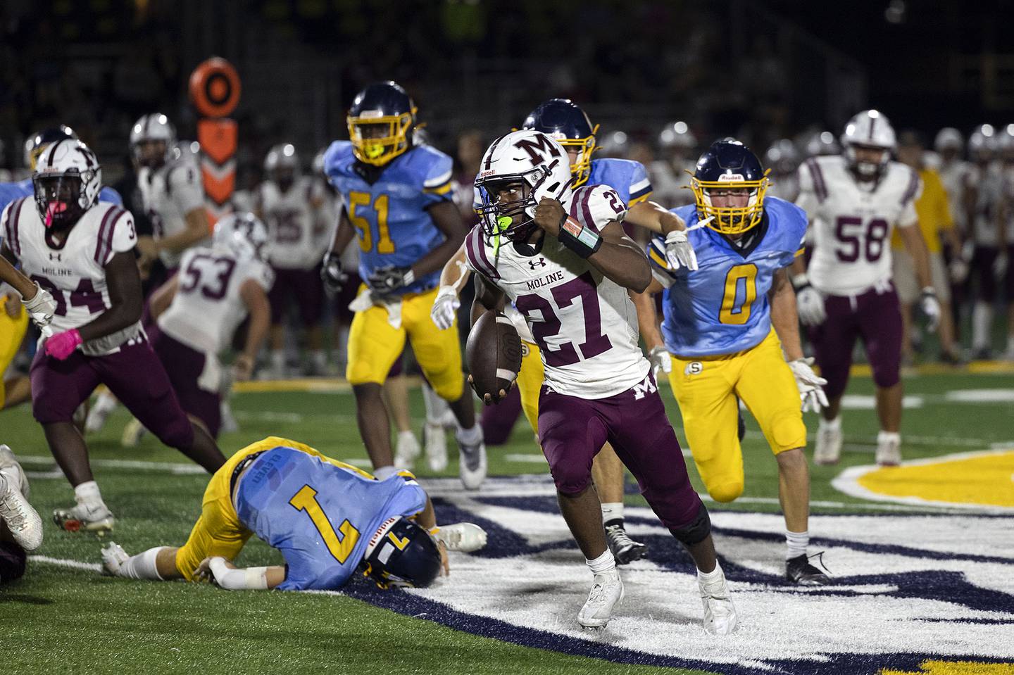 Moline’s Marc Cary runs for a late first half touchdown against Sterling Friday, Sept. 12, 2025.