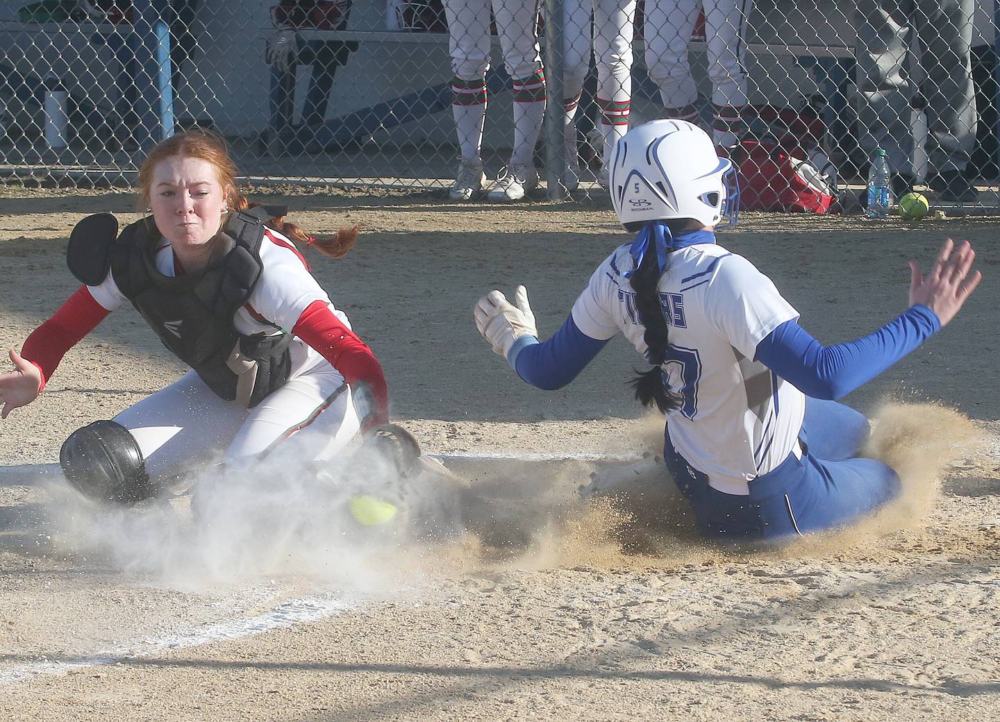 L-P catcher Addison Duttlinger misses a tag on Princeton's Keely Lawson on Tuesday, March 19, 2024 in Princeton.