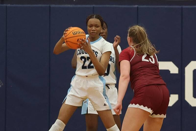 Plainfield South’s Fathia Olagunju secures a rebound against Plainfield North on Thursday, Jan 9, 2025.