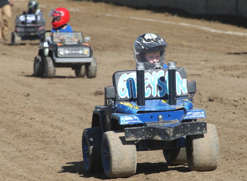 Greyson Lacroix of Bradford, races in the Power Wheels Kids Demo Derby during the 170th annual Bureau County Fair on Saturday, Aug. 23, 2025 in Princeton. Lacroix won first place in the race.