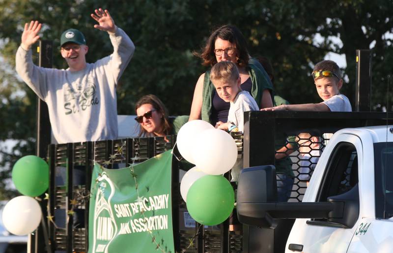 St. Bede alumni association ride in the St. Bede Homecoming Parade on Friday, Sept. 29, 2023 at St. Bede Lane.