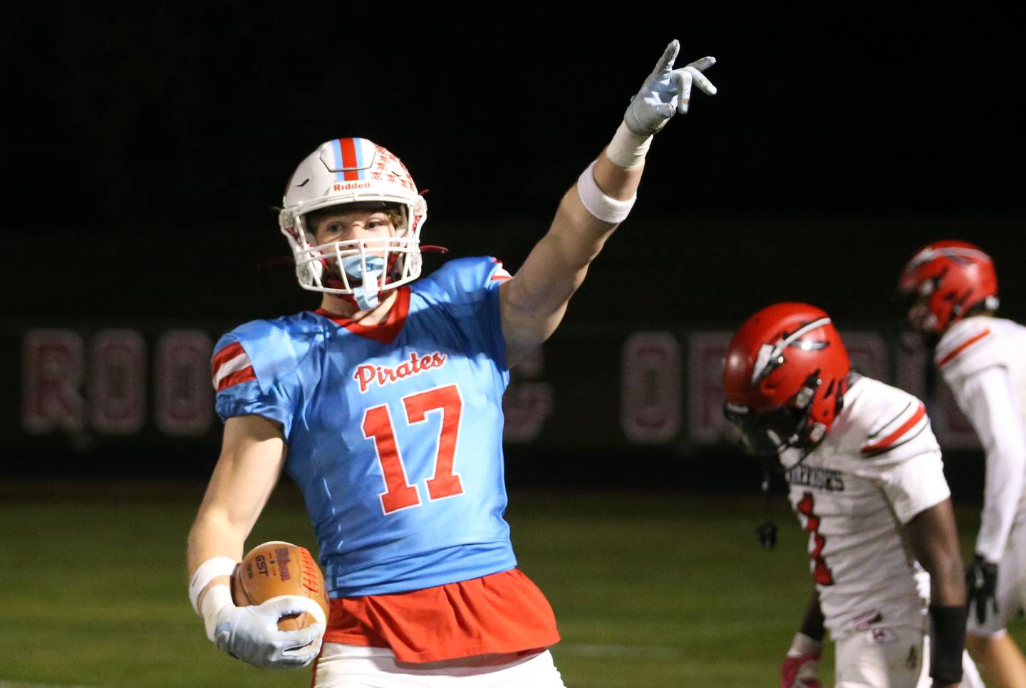 Ottawa's Owen Sanders points to the super fans after scoring a touchdown against Granite City on Friday, Oct. 24, 2025 on Kingman Field at Ottawa High School.