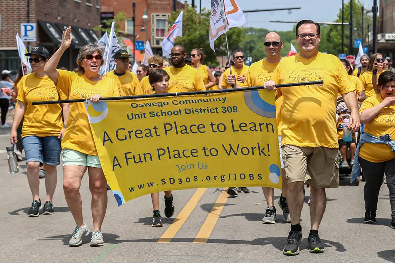 The Oswego community school district 308 at the annual PrairieFest parade in downtown Oswego. June 18, 2023.