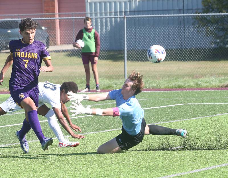 Mendota's Isaac Diaz kicks the ball past Quincy Notre Dame keeper Max Frericks during the Class 1A Sectional semifinal game on Saturday, Oct. 21, 2023 at Illinois Valley Central High School in Chillicothe.