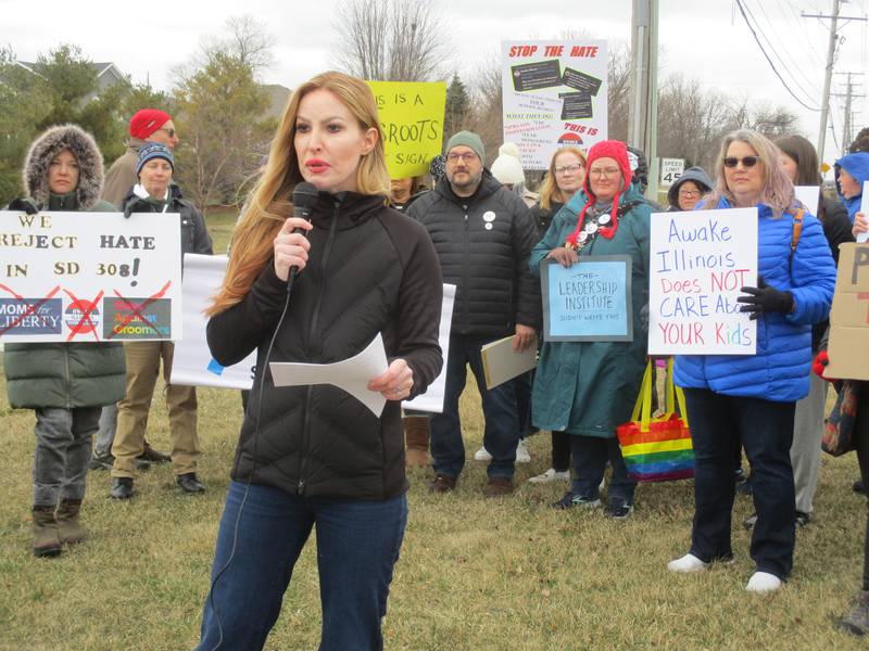 Oswego School District 308 parent Jennifer Stamp leads a rally in support of diversity and LGBTQ+ rights on March 11, 2023 in Oswego.