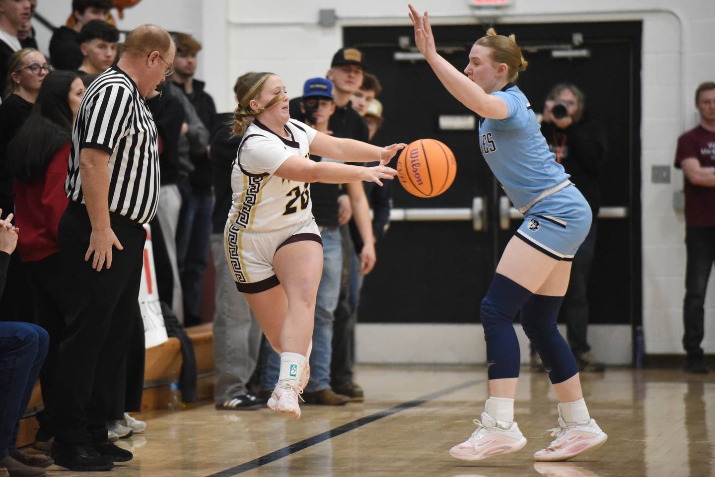 Watseka/Milford's Noelle Schroeder (20) makes a pass while Cissna Park's Addison Lucht defends during a game at Watseka Monday, Feb. 9, 2026.