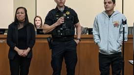 Oswego honors mother and son for subduing man charged in fatal attack at Chick-fil-A 