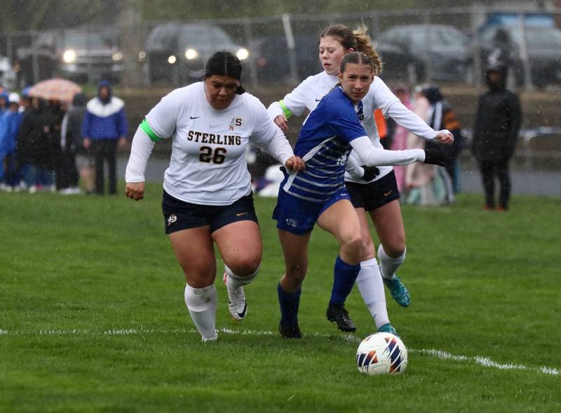 Princeton's Ruby Acker and Sterling's Michelle Diaz race to the the ball Thursday at Bryant Field. The Tigresses won 3-1.