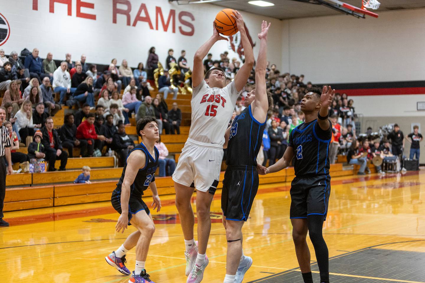 Glenbard East's Jacob Marynowski puts up a jumper against St. Charles North on Tuesday Dec.2,2025 in Lombard.