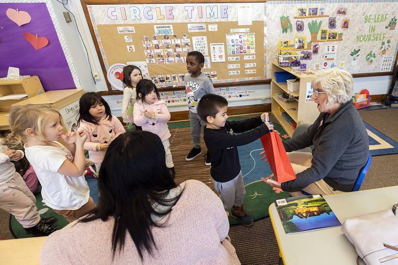 Stacy Flanagan, Chief of Staff for State Rep. Brad Fritts, receives a gift from a class Thursday, Jan. 23, 2025, in the Wallace School TCOC Head Start program.
