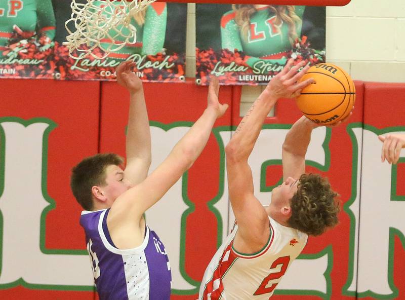 L-P's Regan Doerr eyes the hoop as Rochelle's Eli Schweitzer defends on Friday, Feb. 13, 2026 in Sellett Gymnasium at L-P High School.