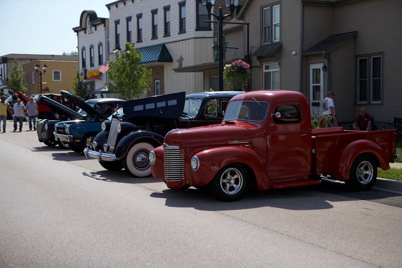 Car show goers gather at the Crusin' to Genoa Car Show on Saturday, Aug.16,2025 in Genoa.