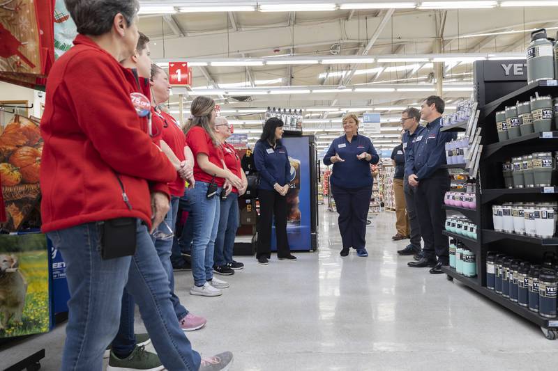 Jane Blain Gilbertson (right), owner/CEO of Blain’s Farm and Fleet, speaks with front of the store employees Thursday, Nov. 9, 2023 in Sterling. Gilbertson took a tour of the store where she and her team met and greeted employees.