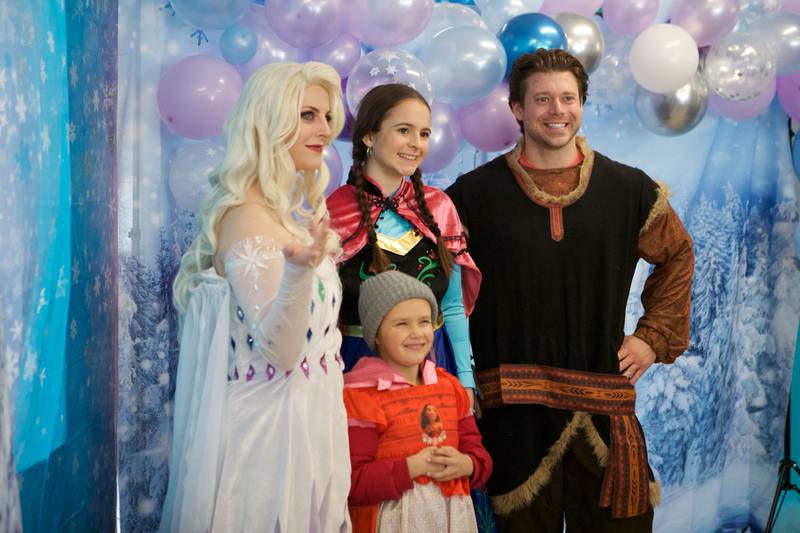 Elsa, Anna, and Kristoff pose for a picture at Frozen Fest at Maryknoll Park on Saturday, Jan. 11, 2025 in Glen Ellyn.