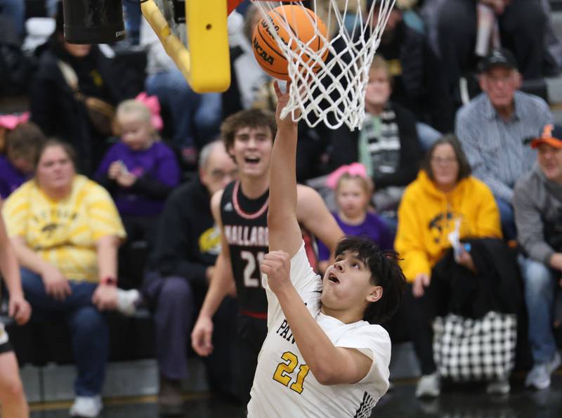 Putnam County's Juan Ramirez runs in to score on a layup over Henry-Senachwine on Friday, Dec. 5, 2025 at Putnam County High School.