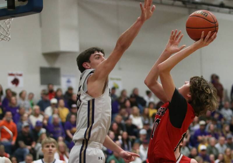 Earlville's Easton Fruit eyes the hoop as Serena's Richie Armour defends during the Little Ten Conference Championship on Friday, Feb. 2, 2024 at Somonauk High School.