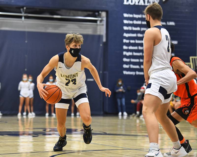 Lemont's Nojus Indrusaitis (23) handling the ball against Minooka on Tuesday, Dec. 21, 2021, at Lemont.