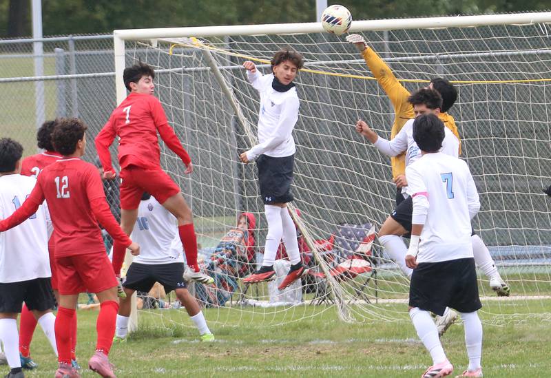Kankakee keeper Nathan Sanchez saves the ball from L-P's Adrian Gonzalez during the Class 2A Regional title game on Saturday, Oct. 25, 2025 at Ottawa High School.