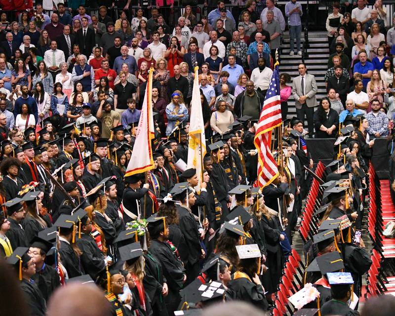 The colors are presented during a flag ceremony after Northern Illinois University Class of 2025 graduates were seated seats at the start of commencement on Saturday, May 10, 2025, held at the Convocation Center in DeKalb.