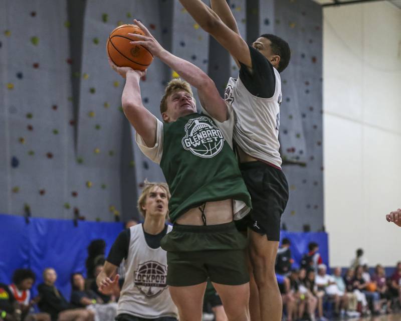 Glenbard West' Chase Cavan puts up a contested shot in their Riverside-Brookfield Shootout basketball game.  June 20, 2025 in Riverside.
