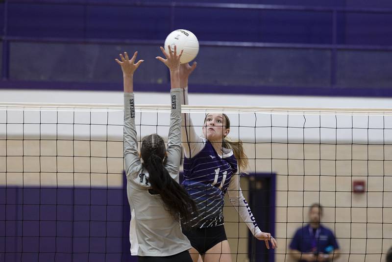 Dixon’s Ella Govig works the net Thursday, Oct. 27, 2022 in the volleyball regional final against Galesburg.
