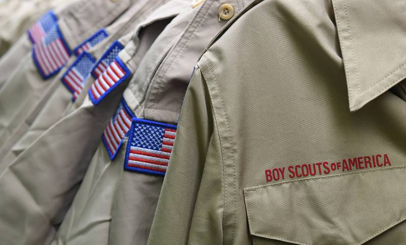 FILE - In this Feb. 18, 2020, file photo, Boy Scouts of America uniforms are displayed in the retail store at the headquarters for the French Creek Council of the Boy Scouts of America in Summit Township, Pa. A bankruptcy judge Thursday, Aug. 19, 2021, approved a proposal by the Boy Scouts of America to enter into an agreement that includes an $850 million fund to compensate tens of thousands of men who say they were sexually abused as youngsters by scout leaders.