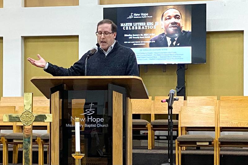 The Rev. Jonathan Crail, senior pastor at First United Methodist Church of DeKalb, reads "The Drum Major Instinct," a sermon delivered by the Rev. Martin Luther King, Jr., at Ebenezer Baptist Church in Atlanta, Georgia, on Feb. 4, 1968. Crail spoke at the annual celebration event on MLK Day held on Monday, Jan. 20, 2025, at New Hope Missionary Baptist Church, 1201 Twombly Road, DeKalb.