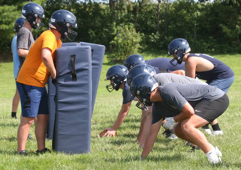 Members of the Bureau Valley football team run a play during camp on Thursday, July 24, 2025 at Hall High School.