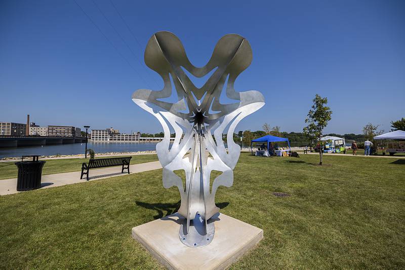“Portal” by Tommy Riefe sits on display at RB&W Park in Rock Falls Saturday, August, 24, 2024. Rock Falls Tourism held their annual Art in the Park sculpture walk featuring nine new works of art.