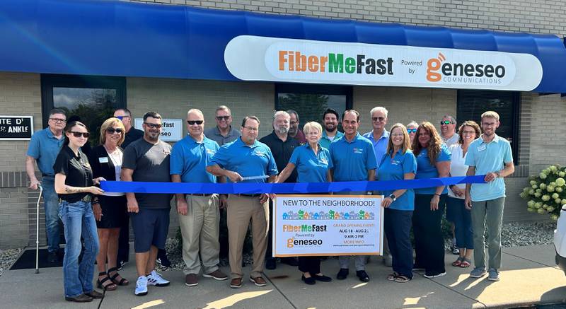 FiberMeFast representatives, Illinois Valley Area Chamber of Commerce members and local city officials gather for a ribbon-cutting Wednesday at the Janko Center in Peru, marking the opening of FiberMeFast’s new office.