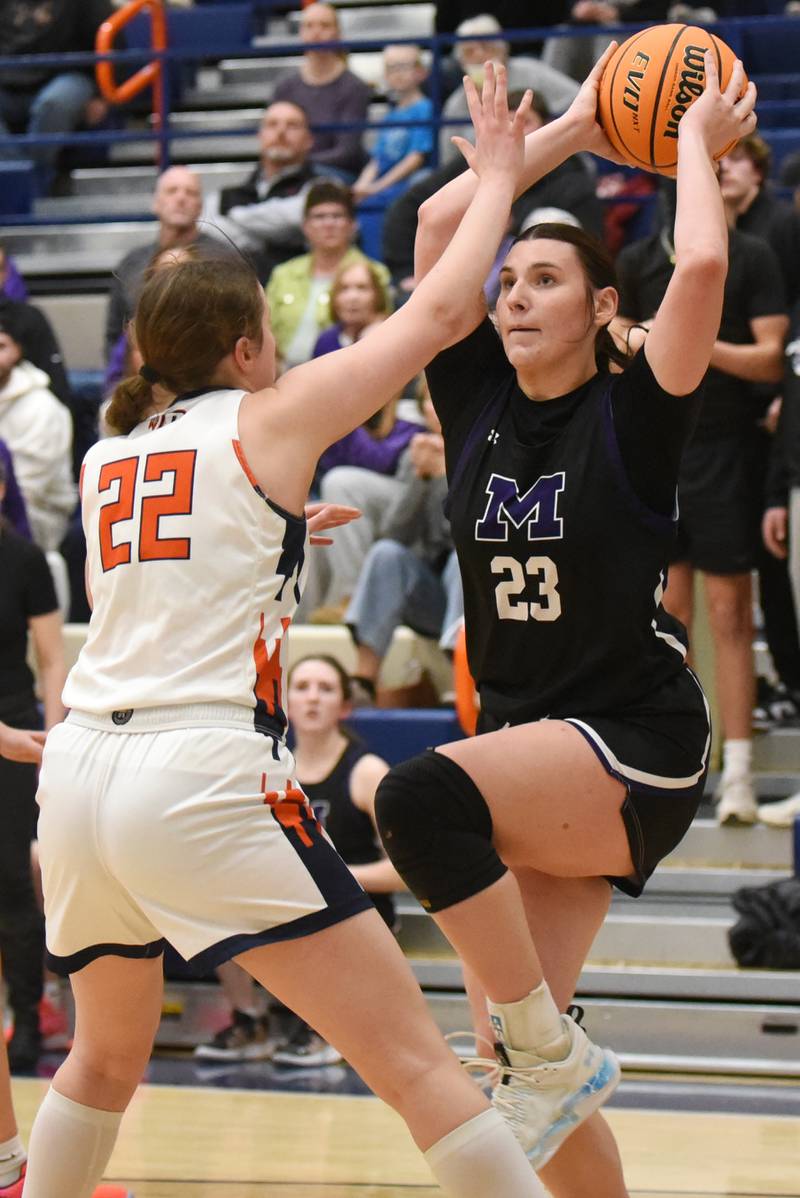 Manteno's Maddie Gesky, right, looks to shoot as Pontiac's Grace Lanning defends during the IHSA Class 2A Pontiac Sectional championship Thursday, Feb. 26, 2026.