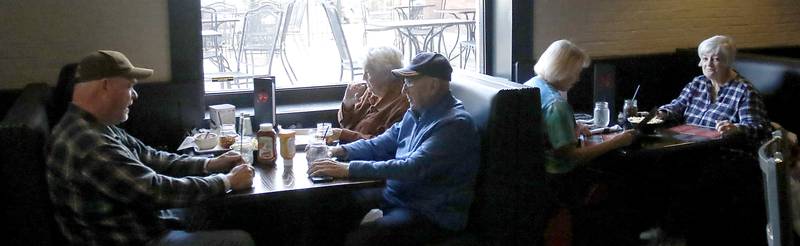 People dine on Tuesday, Nov. 12, 2024, at Squire on the Square in Woodstock. 

The restaurant, which has similar decor as other Village Squire restaurants, is a joint venture between the Linardos family and Bob Karas of Karas Restaurant Group.
Squire on the Square is located in the basement of the Old Courthouse in Woodstock, and its menu will features items similar to the Linardos family’s restaurants and the Village Squire. 

The eatery replaces the Public House that closed at the end of March.