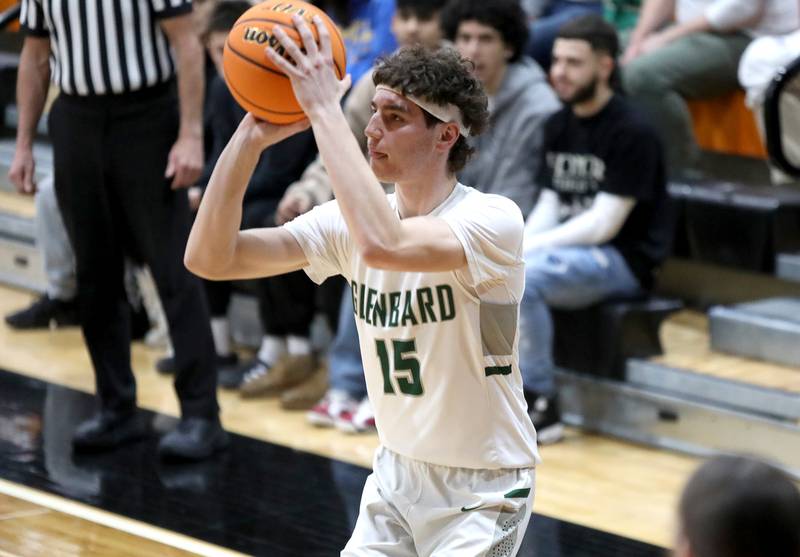 Glenbard West's Drew Gacek shoots the ball during a Class 4A St. Charles East Sectional semifinal against Glenbard East on Tuesday, March 4, 2025 in St. Charles.