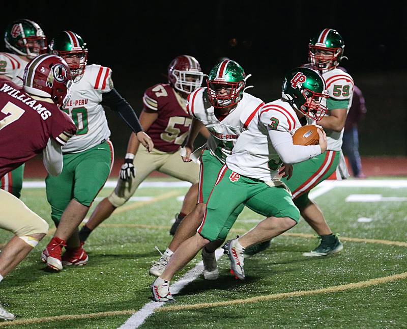 La Salle-Peru quarterback Mason Lynch (3) runs against Morris on Friday, Oct. 28, 2022, in Morris.