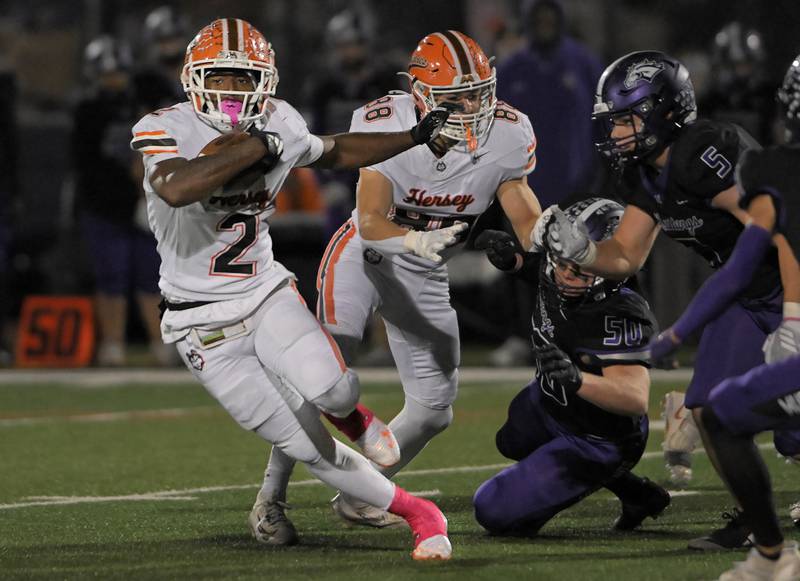 Hersey's Brandon Jenkins makes a cut against Rolling Meadows in a football game in Rolling Meadows on Friday, Oct. 24, 2025.
