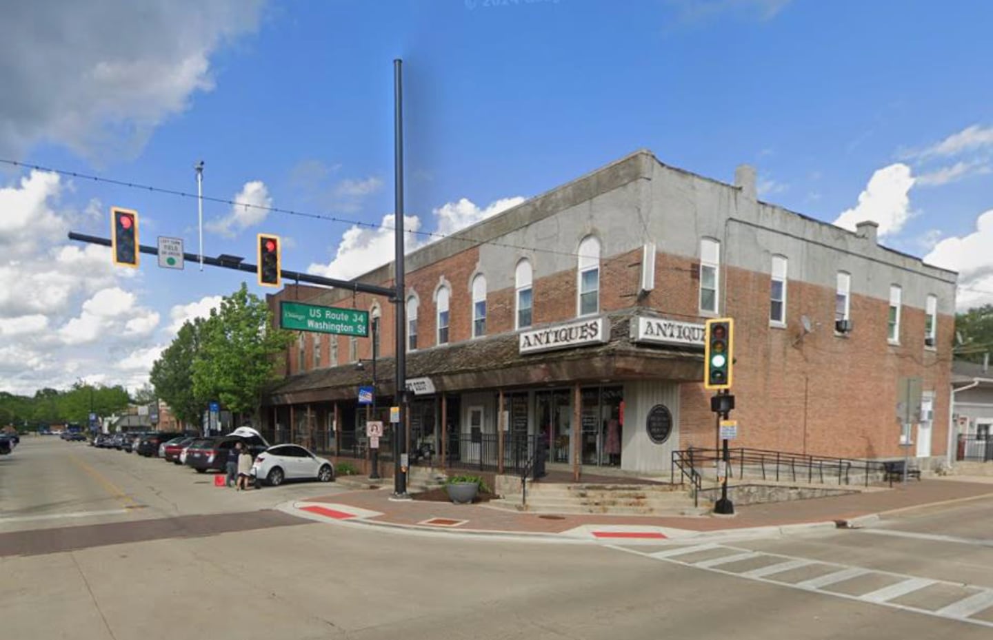 The owner of a brick building in downtown Oswego this month was given permission to finish painting the rest of the building’s exterior even though the village’s ordinance prohibits it.

The petitioner has stated that they painted the brick to create a cohesive look to the structure since the top half of the building had been altered over time to remove/cover the brick at the
second story.