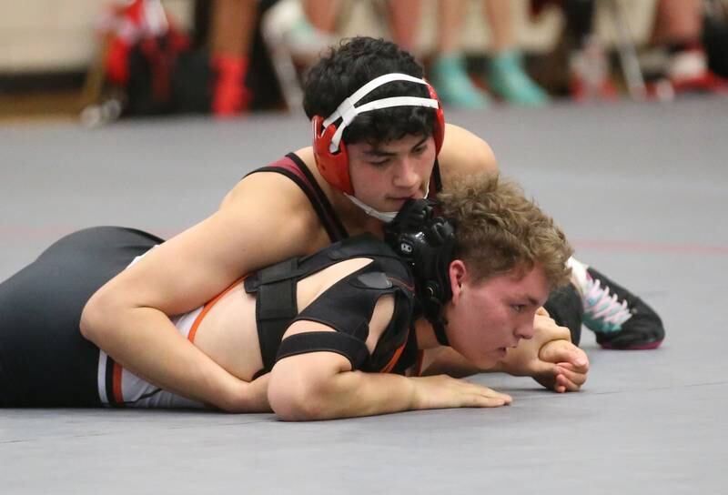 Streator's Alex Lopez wrestles Sandwich's RTristen King during a meet on Wednesday, Dec. 13, 2023 in Sellett Gymnasium at L-P High School.