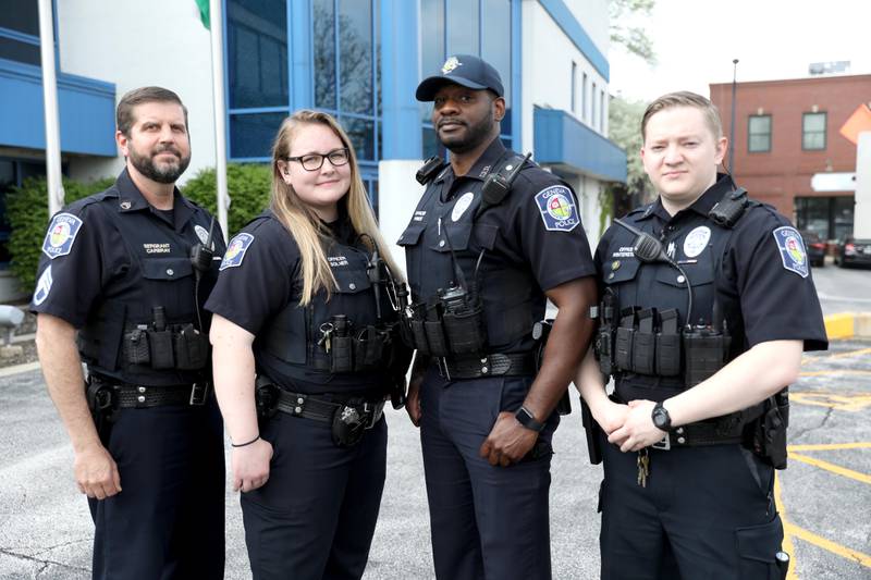 (Left to right) Geneva Police Sgt. George Carbray, Officer Megan Solner, Officer Quantrell Priest and Officer Hunter Winterstein, along with Deputy Chief Brian Maduzia (not pictured) are being credited with saving a man who was threatening to take his life May 4 on the Union Pacific West line train trestle spanning the Fox River.