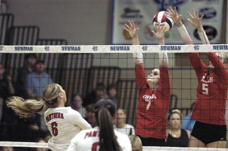 E-P's Avery Olinger hits a ball past two Oregon players. Erie-Prophetstown took on Oregon in the Class 2A regional volleyball semifinal Tuesday, Oct. 29, 2024 at Newman High School.