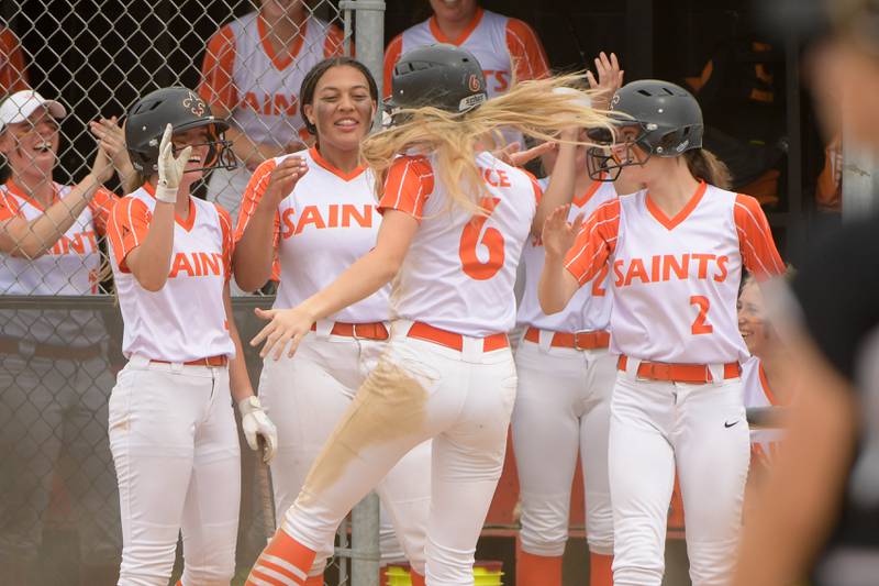 St. Charles East celebrate scoring early in the game against Glenbard North in the Class 4A St. Charles East Sectional semifinal on Tuesday, May 31, 2022.